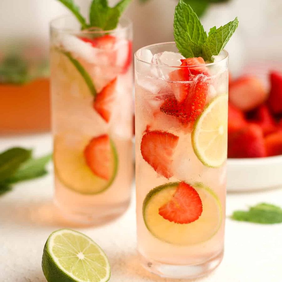 Refreshing Strawberry Mojito Mocktail garnished with fresh strawberries and mint leaves