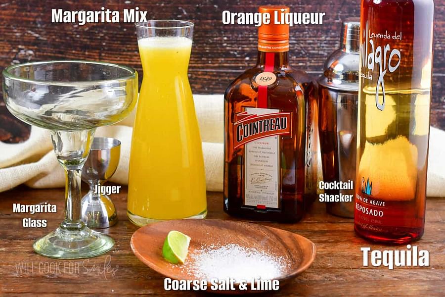 mixing margarita ingredients in a cocktail shaker
