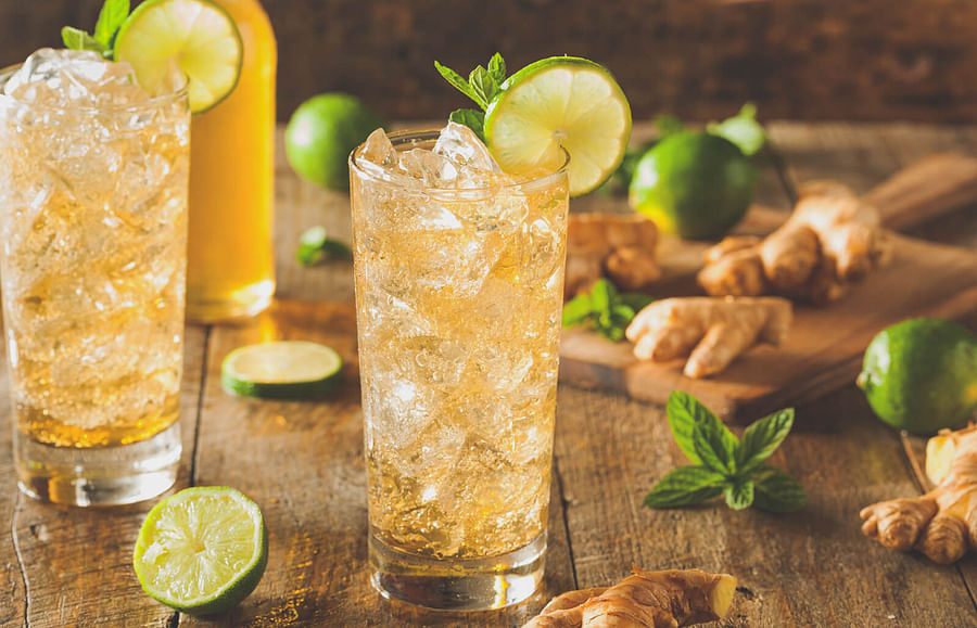 Assortment of colorful ginger beer mocktails in various glasses